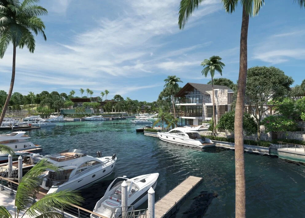 Waterfront villa with pitched roof and glass facade beside the Emerald Bay canal, private boat berth in foreground